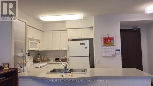 807 - 388 Bloor Street E, Toronto, ON - Indoor Photo Showing Kitchen With Double Sink