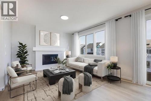 4054 Sawgrass Street Nw, Airdrie, AB - Indoor Photo Showing Living Room With Fireplace
