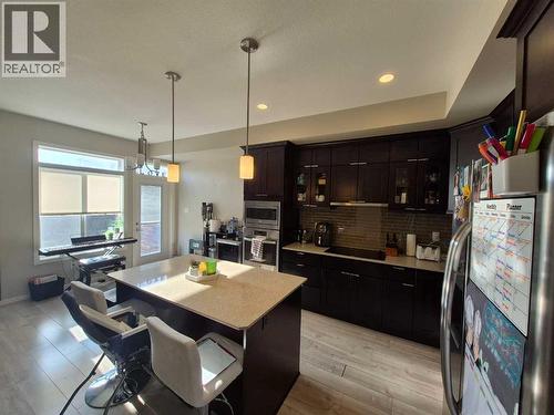 Kitchen - 5, 438 Highlands Boulevard W, Lethbridge, AB - Indoor Photo Showing Other Room