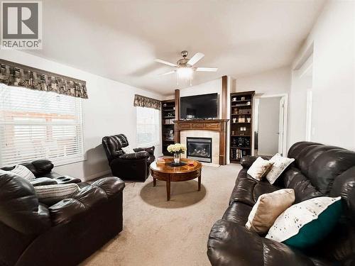 781004 42 Range, Rural Spirit River No. 133, M.D. Of, AB - Indoor Photo Showing Living Room With Fireplace