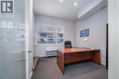 back office - currently a shop workspace - 1029 1 Avenue Ne, Calgary, AB - Indoor Photo Showing Office