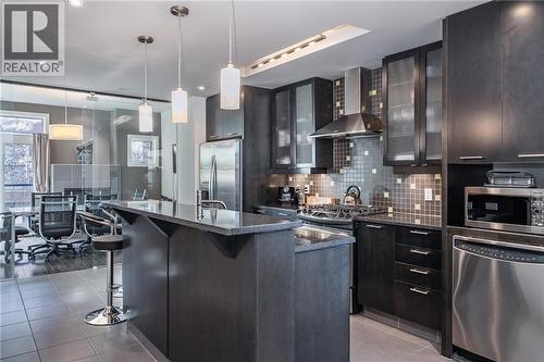 kitchen - 1029 1 Avenue Ne, Calgary, AB - Indoor Photo Showing Kitchen With Upgraded Kitchen
