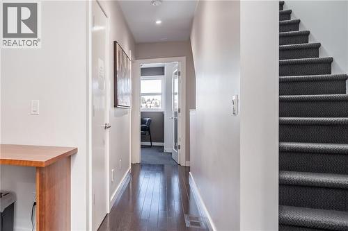 hallway from suite to office - 1029 1 Avenue Ne, Calgary, AB - Indoor Photo Showing Other Room