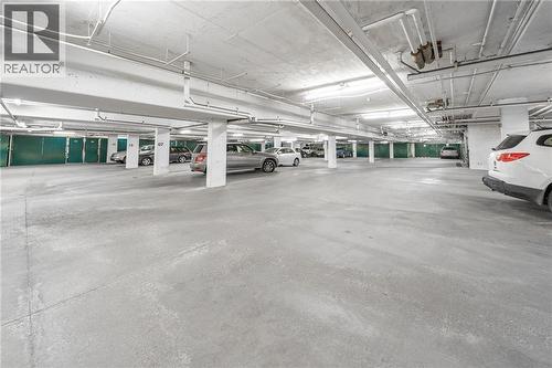 parking 2 - 1029 1 Avenue Ne, Calgary, AB - Indoor Photo Showing Garage