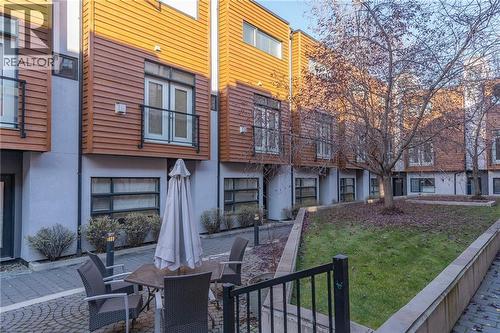 back garden - 1029 1 Avenue Ne, Calgary, AB - Outdoor With Deck Patio Veranda