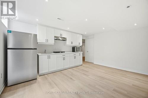 Basement Living Room w/Kitchen - 727 Thompson Road S, Milton, ON - Indoor Photo Showing Kitchen