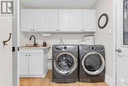 Convenient laundry room with garage access - 