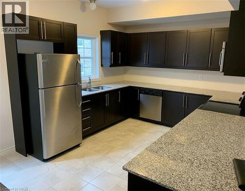 large kitchen with double sink, fridge, stove, microwave range, dishwasher (old photo) - 352 Louisa Street, Kitchener, ON - Indoor Photo Showing Kitchen With Double Sink