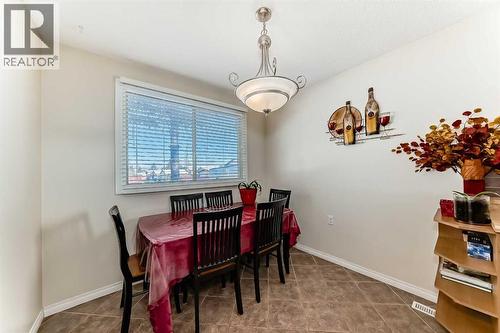 208 Bracewood Road Sw, Calgary, AB - Indoor Photo Showing Dining Room