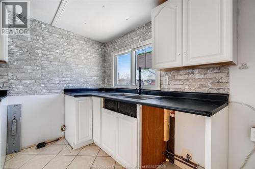 4 Cedar Crescent, Mcgregor, ON - Indoor Photo Showing Kitchen With Double Sink