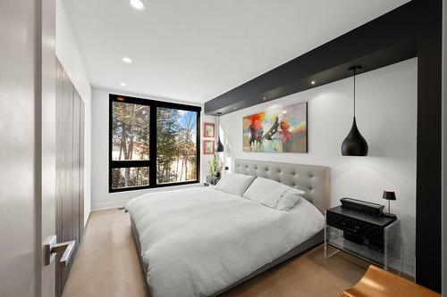 Chambre à coucher principale - 10 Ch. De L'Oxalis, Harrington, QC - Indoor Photo Showing Bedroom