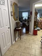 Hallway featuring baseboards - 