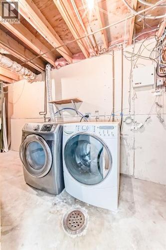 8007 Ranchview Drive Nw, Calgary, AB - Indoor Photo Showing Laundry Room
