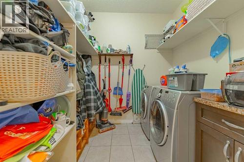 142 West Pointe Circle, Cochrane, AB - Indoor Photo Showing Laundry Room