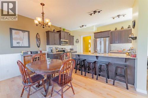 142 West Pointe Circle, Cochrane, AB - Indoor Photo Showing Dining Room