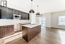 504 Heritage Boulevard, Cochrane, AB  - Indoor Photo Showing Kitchen 