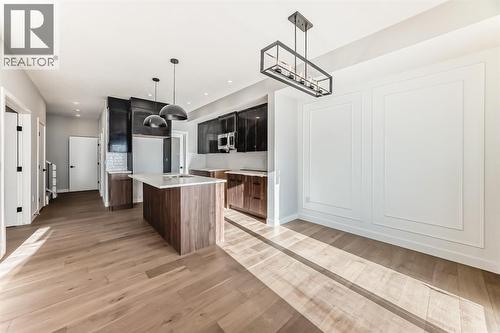 504 Heritage Boulevard, Cochrane, AB - Indoor Photo Showing Kitchen