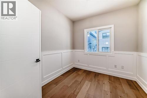 504 Heritage Boulevard, Cochrane, AB - Indoor Photo Showing Other Room