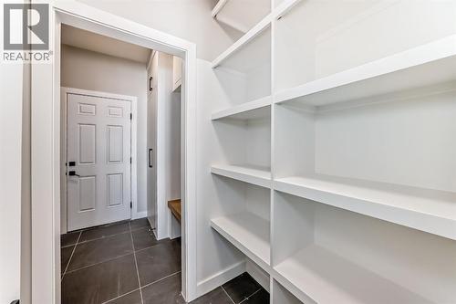 504 Heritage Boulevard, Cochrane, AB - Indoor With Storage