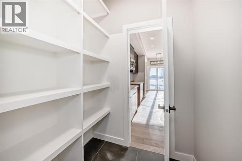 504 Heritage Boulevard, Cochrane, AB - Indoor With Storage