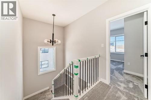 504 Heritage Boulevard, Cochrane, AB - Indoor Photo Showing Other Room