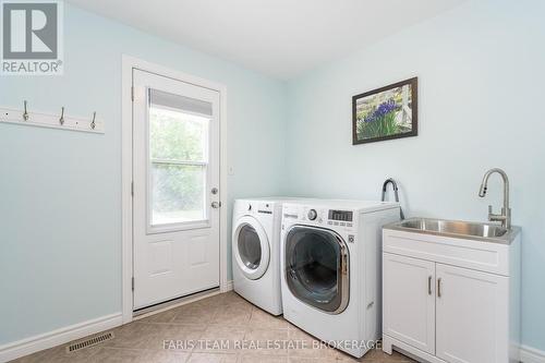32 Cairns Boulevard, Springwater, ON - Indoor Photo Showing Laundry Room