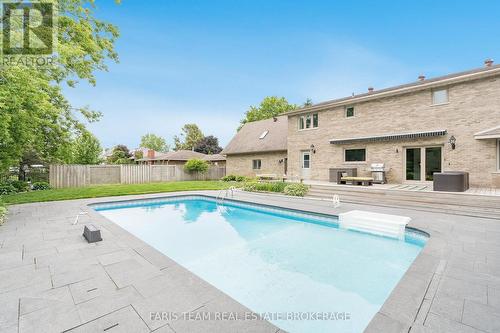 32 Cairns Boulevard, Springwater, ON - Outdoor With In Ground Pool With Backyard