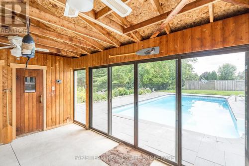 32 Cairns Boulevard, Springwater, ON - Indoor Photo Showing Other Room With In Ground Pool