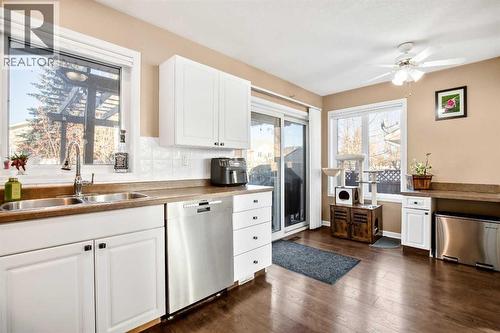 New dishwasher 2023 - 830 Westmount Drive, Strathmore, AB - Indoor Photo Showing Kitchen With Double Sink