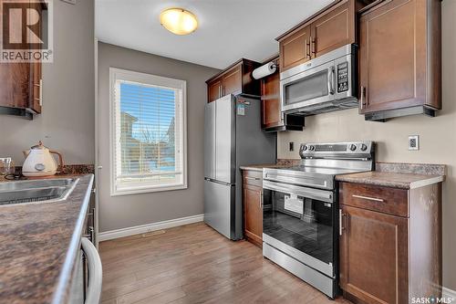 5302 Mitchinson Way, Regina, SK - Indoor Photo Showing Kitchen With Double Sink