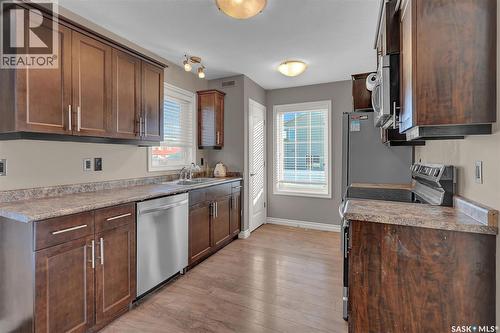 5302 Mitchinson Way, Regina, SK - Indoor Photo Showing Kitchen With Double Sink