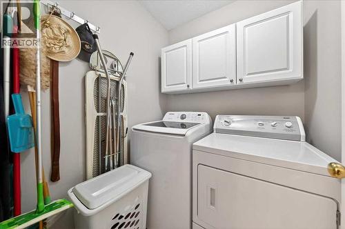 206 Cougarstone Circle Sw, Calgary, AB - Indoor Photo Showing Laundry Room