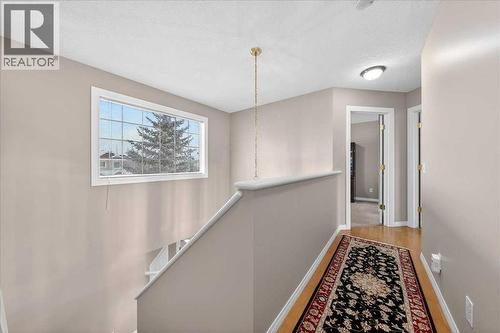 206 Cougarstone Circle Sw, Calgary, AB - Indoor Photo Showing Other Room