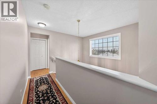 206 Cougarstone Circle Sw, Calgary, AB - Indoor Photo Showing Other Room