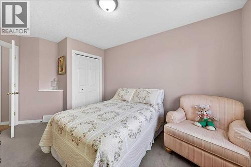 206 Cougarstone Circle Sw, Calgary, AB - Indoor Photo Showing Bedroom