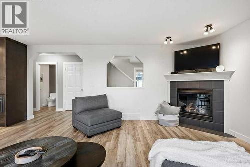 141 Lavender Link, Chestermere, AB - Indoor Photo Showing Living Room With Fireplace