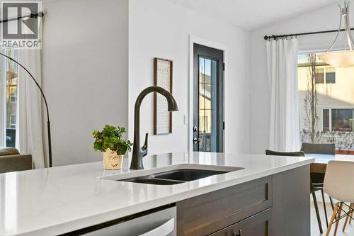 141 Lavender Link, Chestermere, AB - Indoor Photo Showing Kitchen With Double Sink With Upgraded Kitchen