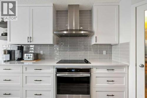 141 Lavender Link, Chestermere, AB - Indoor Photo Showing Kitchen With Upgraded Kitchen