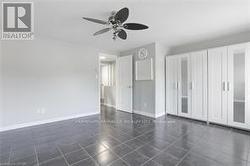 Unfurnished bedroom with celling fan - 