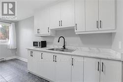 light stone counters, and abaseboard heating unit - 