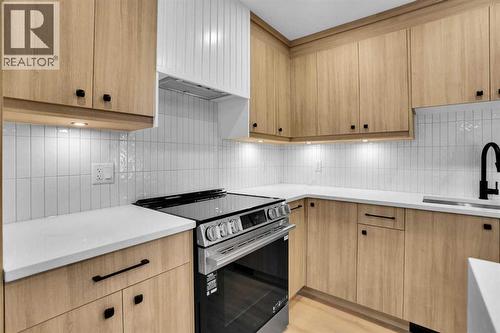 77 Ferncliff Crescent Se, Calgary, AB - Indoor Photo Showing Kitchen