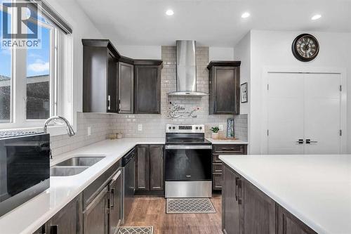 111 Cityside Road Ne, Calgary, AB - Indoor Photo Showing Kitchen With Double Sink With Upgraded Kitchen