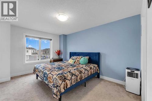 111 Cityside Road Ne, Calgary, AB - Indoor Photo Showing Bedroom