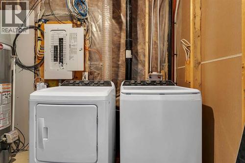 111 Cityside Road Ne, Calgary, AB - Indoor Photo Showing Laundry Room