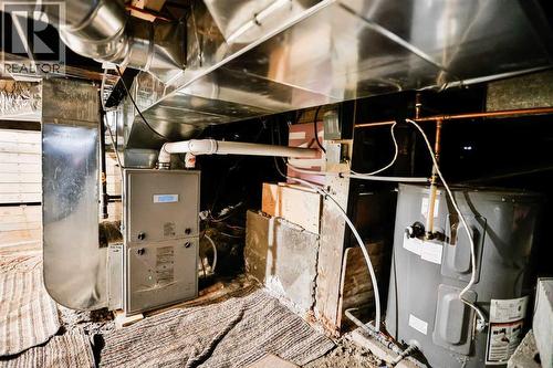 236 N 100 W, Raymond, AB - Indoor Photo Showing Basement