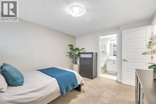 344 Cranbrook Square Se, Calgary, AB - Indoor Photo Showing Bedroom