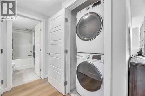 344 Cranbrook Square Se, Calgary, AB - Indoor Photo Showing Laundry Room
