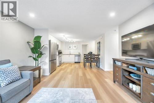 344 Cranbrook Square Se, Calgary, AB - Indoor Photo Showing Living Room