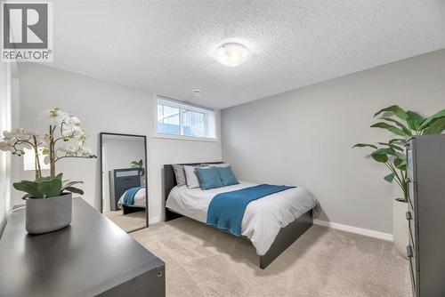 344 Cranbrook Square Se, Calgary, AB - Indoor Photo Showing Bedroom