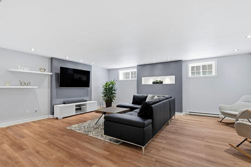 Family room - 55 Rue De Lavours, Terrebonne (Terrebonne), QC - Indoor Photo Showing Living Room
